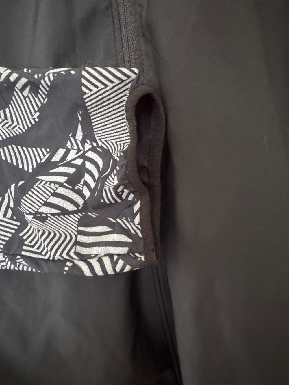Nike Women’s Black Hooded Zip Jacket with Reflective Patterned Sleeves - Picture 5 of 9